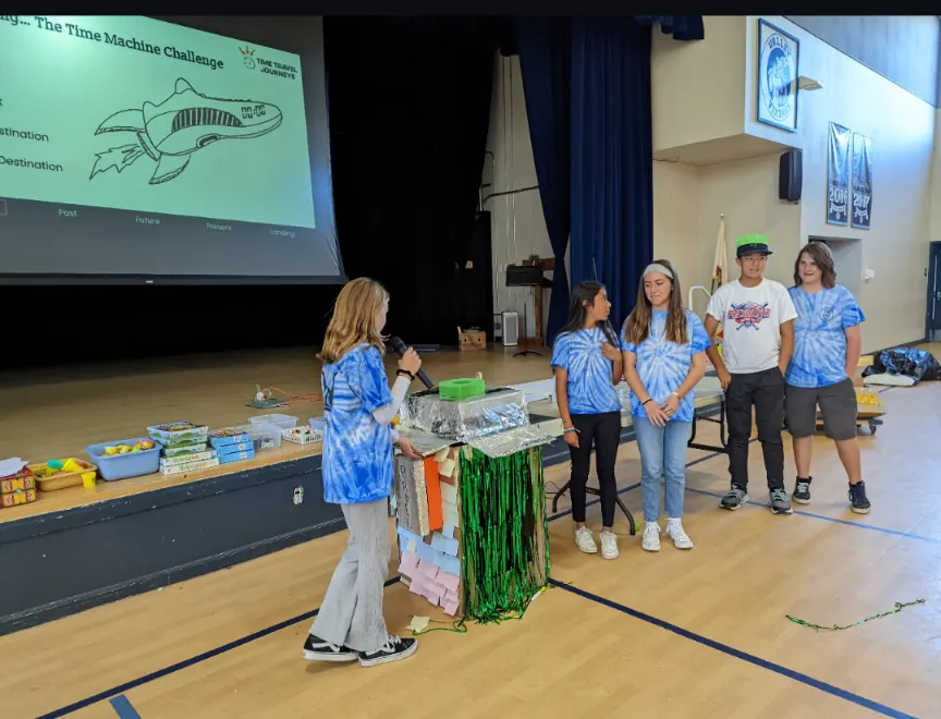 Students presenting their time machine at the Time Machine Challenge